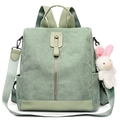 Light green corduroy multi-purpose backpack with side pockets and a plush rabbit charm - Green
