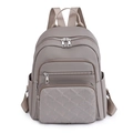 Sac à dos taupe pour femme en tissu Oxford avec broderie matelassée et multi-zips - Kaki