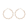 Exaggerated geometric gold metal hoop earrings with white pearls in a twisted design - Gold