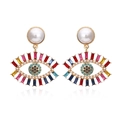 Golden evil eye earrings with colorful rhinestones and white pearls on white background - Multicolor