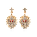 Icy lion head dangle earrings with sparkling crystal pavé and red stone eyes for women - Gold