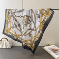 Close-up of luxury baroque silk scarf featuring golden chain patterns and black borders - 70CM Single Side / Black