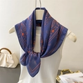 Blue silk-feel square scarf with orange paisley print displayed on white knit top - 70cmx70cm / Navy Blue