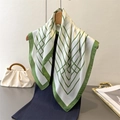 Classic green geometric grid silk scarf styled on a wooden hanger with a dark sweater - Green / 70cmx70cm