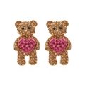 Funkelnde Kristall Bären Ohrringe mit rosa Herz Detail auf weißem Hintergrund - Brauner Bär mit rosa Herz