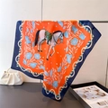Close-up of equestrian print silk scarf with white horse and floral patterns - 66-70cm / FG305-1 Orange