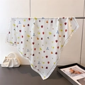 Elegant floral silk scarf in beige with colorful patterns hanging on a metal rack - 66-70cm / White (FG327-1)