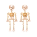 Golden skeleton earrings with white pearl accents in a gothic halloween style for women - Gold