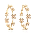 Golden flower hoop earrings with sparkling rhinestones in a symmetrical front view - Gold