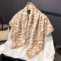 Elegant animal print faux silk scarf draped over white shirt with zebra pattern design - 90x90cm / Khaki