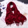 Detail of burgundy cashmere scarf with tassel fringe and quality material label - Wine Red (FYR150-01)