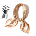 Detail of champagne satin square scarf with white polka dots tied as a chic necktie - 70x70cm / Khaki