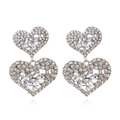 Boucles d'oreilles cœur argentées avec strass brillants et motif floral élégant de luxe - Blanc