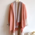 Detail of pink and grey double-sided cashmere-like scarf with fringe on a beige coat - 200x65cm / Dusty Pink And Gray (WT350-1)