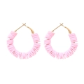 Bohemian gold hoop earrings featuring vibrant pink polymer clay beads on white background - Pink