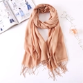 Solid light apricot faux cashmere scarf with tassels, styled with fashion accessories - Yellow Khaki