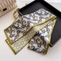 Detail of paisley silk scarf with green borders on a vintage tray and quilted bag - Cream Blue Yellow Paisley Style (LJ21-H290) / 145x12cm