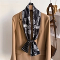 Elegant chain print skinny scarf tied on a beige blazer, urban fashion accessory for women - Black and White Retro Chain Tassel (LJ21-H294) / 145x12cm