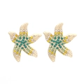 Starfish earrings with gold plating, colorful rhinestones and pearl details on white background - Mixed Color A (Green Yellow Rhinestone Gold Base)