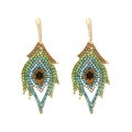 Exaggerated golden leaf earrings with multicolor crystals and peacock feather design - Colorful