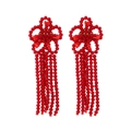 Boucles d'oreilles bohèmes à pompons en perles de cristal rouge tressées à la main - Rouge