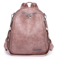 Vista frontal de una mochila de cuero sintético rosa palo con gran capacidad y cremalleras - Rosa
