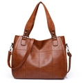 Brown patchwork leather tote bag with elegant stitching and adjustable shoulder strap - Brown