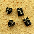 Close-up of gothic gold cross reliefs on black heart and rectangular jewelry charms - Heart Style(c124) / Black/Gold