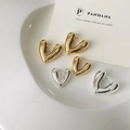 Polished 18K gold and silver chunky heart hoop earrings shown on a white ceramic tray - Large (F108) / Gold