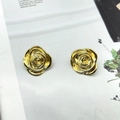 Macro shot of gold-plated rose earrings with 18K texture on a magazine background - Rose Flower Style (1E209) / Gold