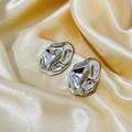 Irregular silver molten metal hoop earrings with hammered texture on gold silk fabric - Silver Oval