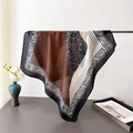 Detail of lightweight paisley pattern scarf with brown color block and fringed edge texture - 68*68cm / Brown