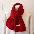 Detail of wool blend knit scarf in vibrant red with ribbed edges on a mannequin display - 164x22cm / Red (WT282-7)