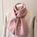 Detail view of pink wool blend knit scarf with wool blend tag and ribbed edge finish - 164x22cm / Pink (WT282-9)