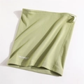 Detail view of adjustable drawstring and knitted texture on light green neck gaiter - Green