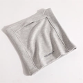 Close-up of grey and white striped thermal neck warmer with Halowint brand logo detail - White and Gray Stripe