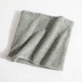 Detail of grey knitted neck warmer showing fine texture and soft fabric material - Light Green