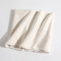 Detail shot of a thick cream fleece neck gaiter with soft insulated thermal texture - Off-white