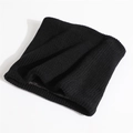 Detailed macro view of black ribbed knit texture on thermal neck warmer for winter - Black