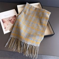 Detail of grey and orange plaid knit scarf with soft tassels on a minimalist tray - 200cmx66cm (Including Tassels) / Yellow Blue Plaid
