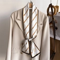 Elegant white silk scarf with orange belt and gold chain pattern on a beige blazer - White Base Orange Belt Chain (LJ21-H280) / 145x12cm