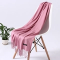 Pink cashmere feel scarf with fringe tassel detail draped on a white chair - Dusty Rose (FYR150-08)