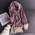 Detail of a deep purple scarf with mandala paisley patterns and soft fringes in a gift box - Jacquard Deep Red Purple