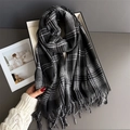 Close-up of black and white checkered scarf with soft fringe and thick warm knit texture - Black and White Grid (WT271-7)