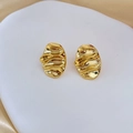 Detailed view of 18K gold plated oval earrings featuring unique wavy textured surface - Gold-B112
