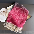 Detail of red and pink paisley scarf showing soft texture and fine white tassel fringe - Red (WT277-1)