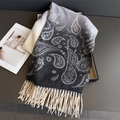 Detail of paisley pattern and long tassels on a grey gradient cashmere scarf - Black (WT277-2)