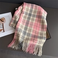 Close-up of pink and beige plaid pattern with fringe tassels on soft cashmere-like scarf - Pink