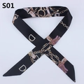 Detail view of black silk twilly with gold chain and pink tassel print for handbag handles - Black Equestrian Chain (PDS-1)