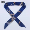 Detail view of navy blue skinny scarf featuring vintage gold chain and stirrup patterns - Navy Blue Gold Chain (PDS-2)